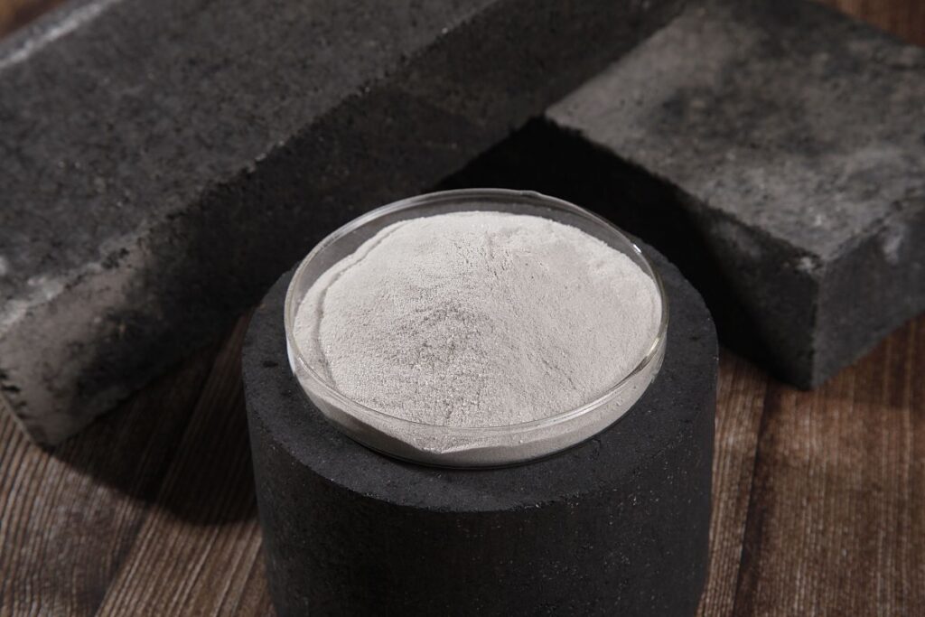 jianjie binder for coke briquettes in white powdery form paced on a coke briquette
