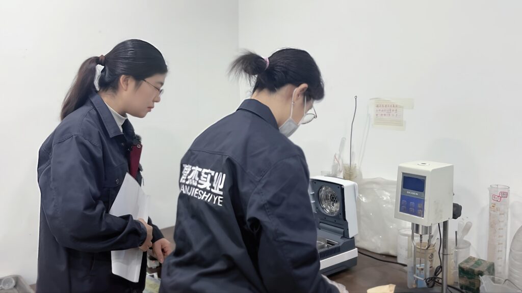 jianjie engineers in lab doing test